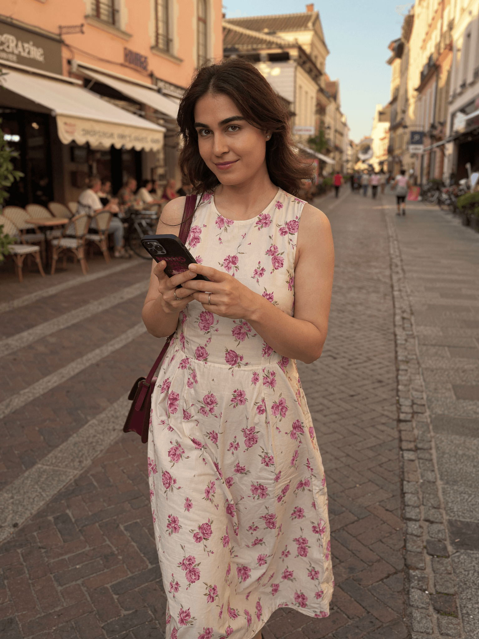 Shomaila vlogging on a European street